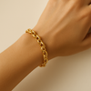 14k Gold Women’s Curb Link Bracelet shown on model hand – elegant Italian design