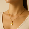 14k Gold Pendant Necklace worn on model neck – minimalist luxury jewelry photography
